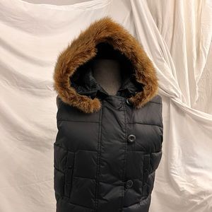 Gap puffer vest with detachable fur trim.